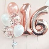 Композиция шаров с цифрами 16 в розовом золоте