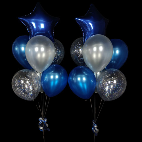 фонтаны шаров с синими звездами и конфетти